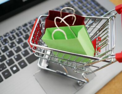 A Miniature Version of Shopping Cart on Laptop Keyboard