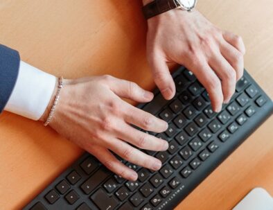 businessman typing on keyboard